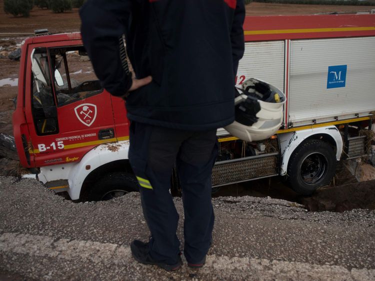 Firefighter dies after truck overturns in flash floods Firefighter dies after truck overturns in flash floods
