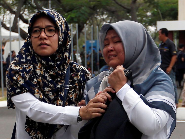 Relatives of passengers of Lion Air flight JT610 that crashed into the sea arrive at Soekarno Hatta International airport near Jakarta, Indonesia, October 29, 2018. REUTERS/Willy Kurniawan