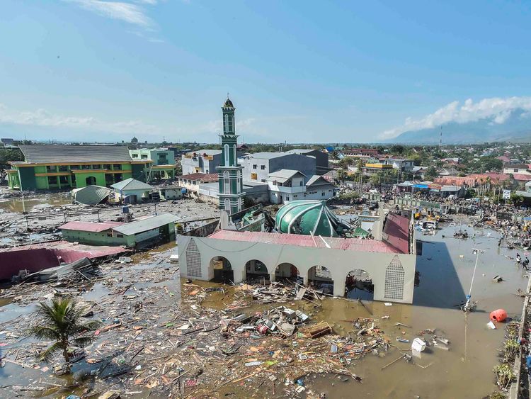 Debris surrounds a mosque in West Palu