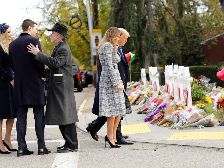 White House senior advisers Jared Kushner and Ivanka Trump speak with Rabbi Jeffrey Myers as U.S. President Donald Trump and first lady Melania Trump pay their respects outside the Tree of Life synagogue in the wake of the shooting at the synagogue where 11 people were killed and six people were wounded in Pittsburgh, Pennsylvania, U.S