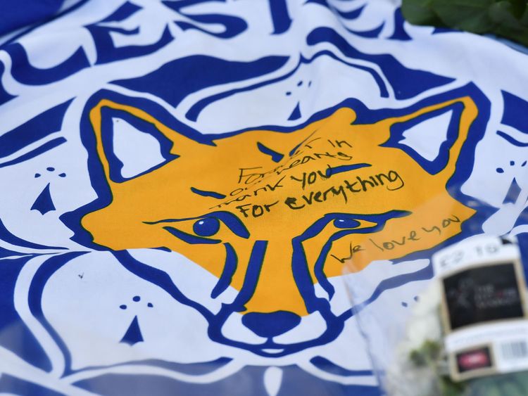 Leicester City fans leave flowers and tributes at the King Power Stadium after a helicopter crash involving Thai owner Vichai Srivaddhanaprabha