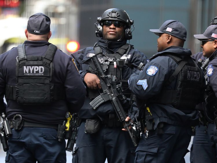New York Police Department Counter Terrorism officers continue to investigate after a package sent to Time Warner Center