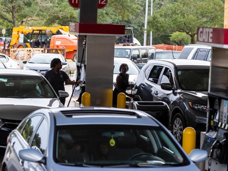 Drivers line up for gasoline as Hurricane Michael bears down on the northern Gulf coast of Florida on October 8, 2018 in Tallahassee, Florida