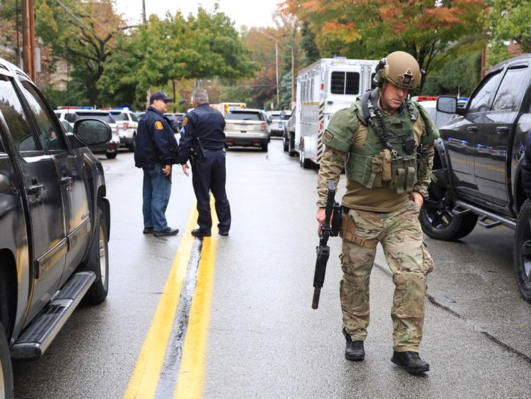 Police officers respond after a gunman opened fire at the Tree of Life synagogue in Pittsburgh Pennsylvania...