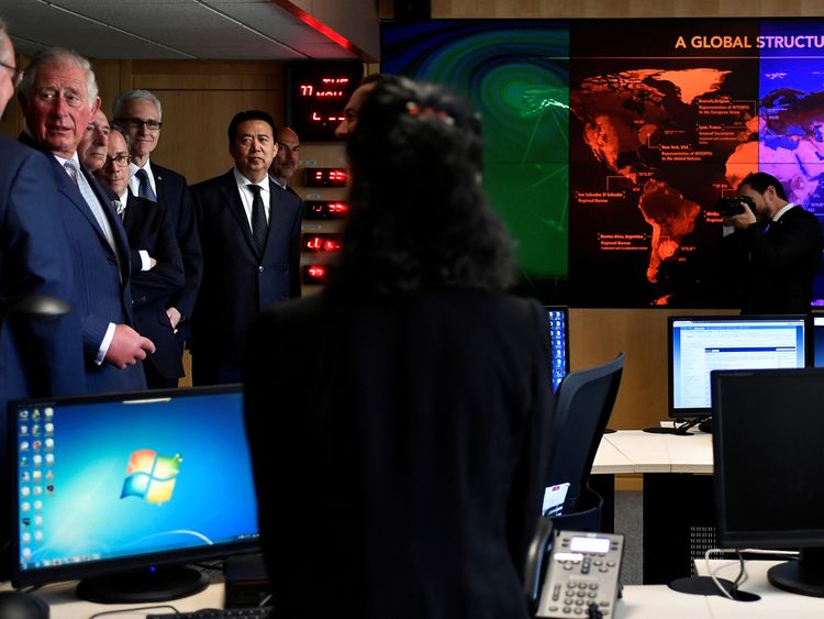 Prince Charles is pictured with Meng Hongwei during his visit to Interpol in May