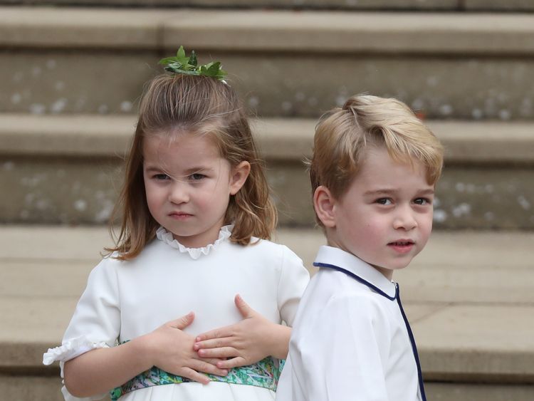 Princess Charlotte and Prince George arrive for the wedding of Princess Eugenie to Jack Brooksbank at St George's Chapel in Windsor Castle, Britain October 12, 2018. Steve Parsons/Pool via REUTERS