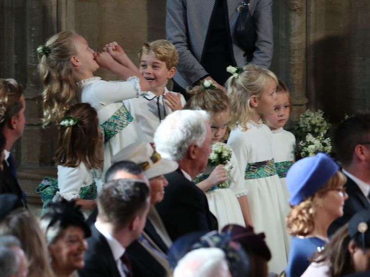 The bridesmaids and page boys, including Princess Charlotte of Cambridge (L), Savannah Phillips (2L) and Prince George of Cambridge (3L) 