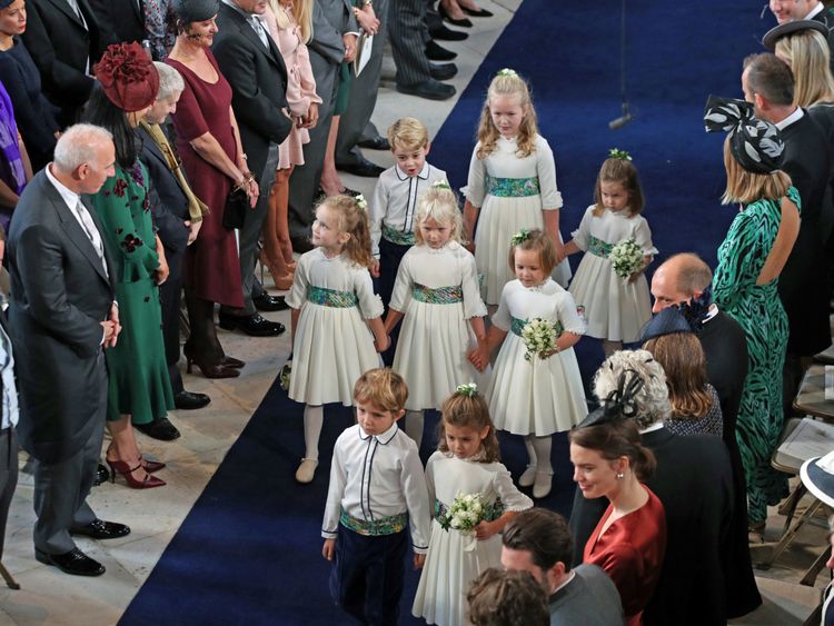 Bridesmaid Princess Charlotte (right) and Lady Louise Mountbatten-Windsor arrives for the wedding of Princess Eugenie to Jack Brooksbank at St George's Chapel in Windsor Castle, Britain October 12, 2018. Aaron Chown/Pool via REUTERS
