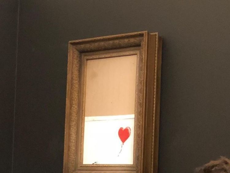 Banksy's Girl With Red Balloon mysteriously shreds after its sale at Sotheby's London. Pic: Sotheby's