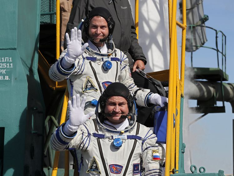 International Space Station (ISS) crew members astronaut Nick Hague of the U.S. and cosmonaut Alexey Ovchinin of Russia board the Soyuz MS-10 spacecraft 