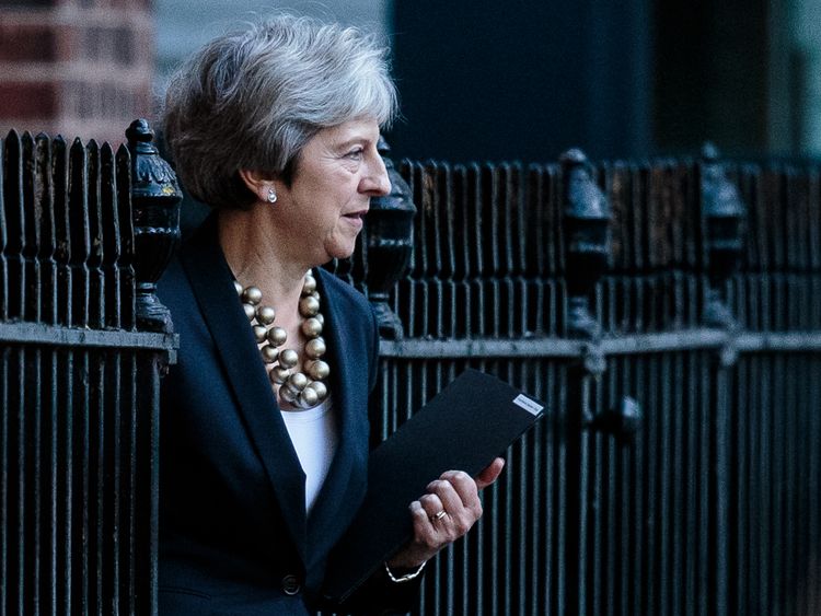 Theresa May leaves the back of Number 10 Downing Street
