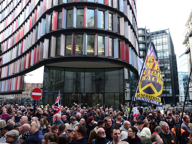 The crowd being addressed by Tommy Robinson after leaving the Old Bailey, London where Judge Hilliard said his case should go to the Attorney General for his consideration after receiving a statement from Robinson on Monday. 