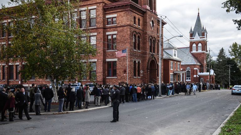 Mourners line up in front of St. Stanislaus Roman Catholic Church to pay their respects to some of the victims in last weekend&#39;s fatal limo crash on October 12, 2018 in Amsterdam, New York
