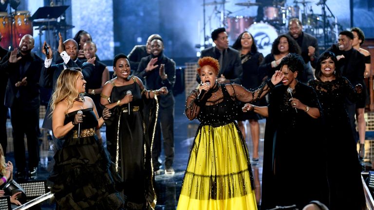 Gladys Knight, Ledisi, Donnie McClurkin, CeCe Winans, Erica Campbell, and Tina Campbell perform a gospel tribute to the late Aretha Franklin onstage during the 2018 American Music Awards 