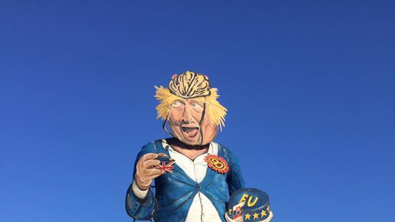The effigy boasts a heavy Brexit theme, including an EU cake. Pic: Edenbridge Bonfire Society