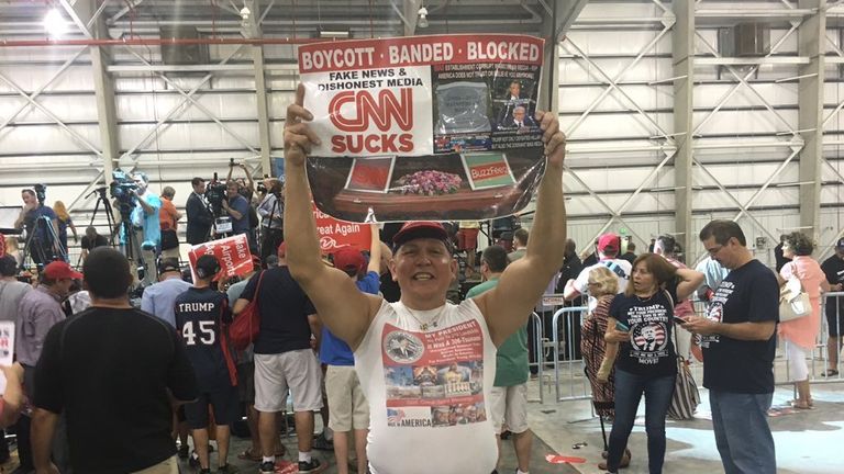 Here Sayoc holds up a sign saying CNN sucks. One of the pipe bombs was sent to CNN. Pic: Cesar Sayoc