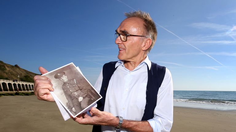 Filmmaker Danny Boyle holds a photograph of Private Walter Bleakley, who was from the same street where Danny went to school, as he announces plans for his Armistice Day commission