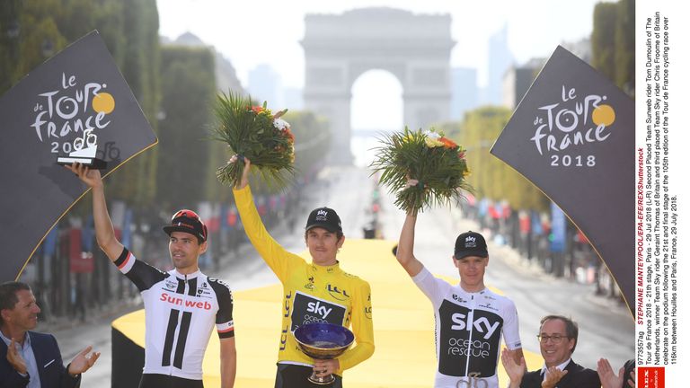 Geraint Thomas (C)  following the 21st and final stage of the 105th edition of the Tour de France cycling race