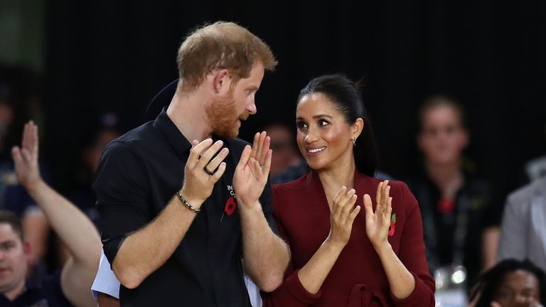 Prince Harry, Duke of Sussex and Meghan, the Duchess of Sussex participate in the medal ceremony following the gold medal match of the Wheelchair Basketball between the Netherlands and the United States during day eight of the Invictus Games Sydney 2018 at The Quay Centre on October 27, 2018 in Sydney, Australia