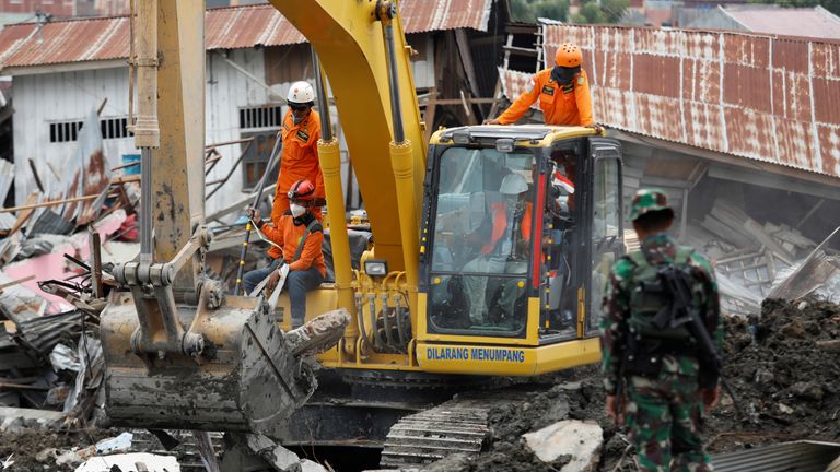 Search teams look for victims in the earthquake and liquefaction affected Balaroa neighbourhood in Palu, Central Sulawesi, Indonesia