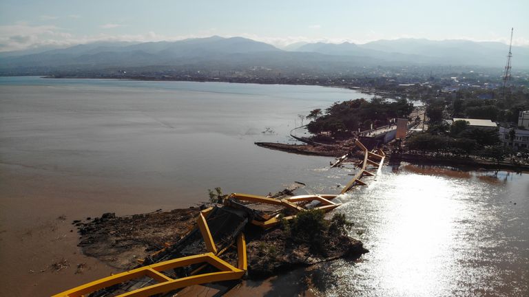 A bridge has collapsed in Palu, where most of the dead have so far been found