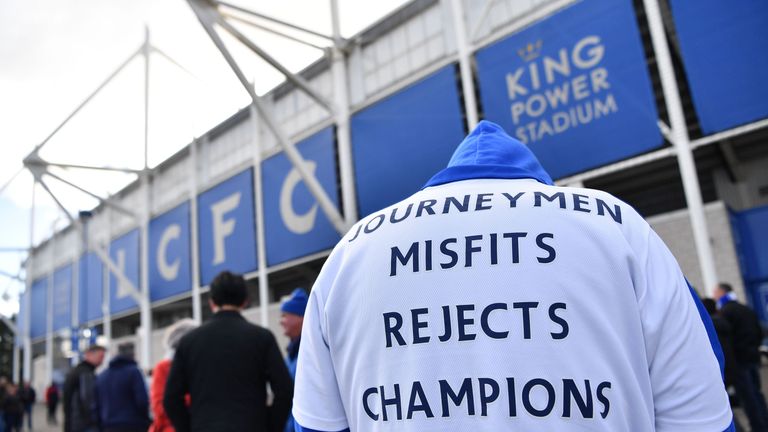 Leicester City fans gather at the King Power Stadium after a helicopter crash involving Thai owner Vichai Srivaddhanaprabha