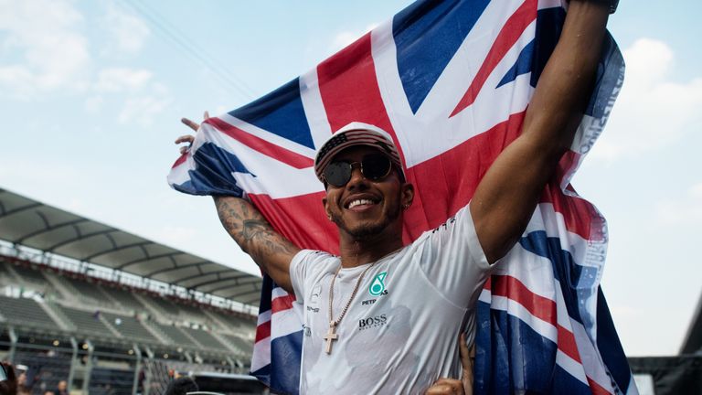 Lewis Hamilton celebrates clinching his fifth title with two races to spare