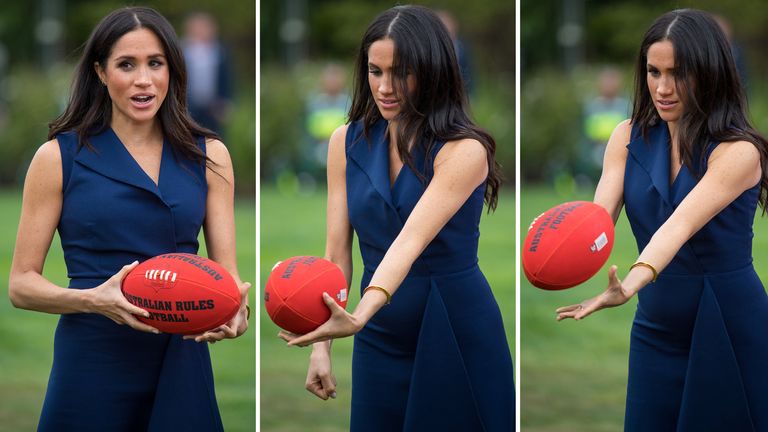 Meghan handballs an Australian Rules football while watching a demonstration of sporting activities organised by the This Girl Can campaign in Melbourne