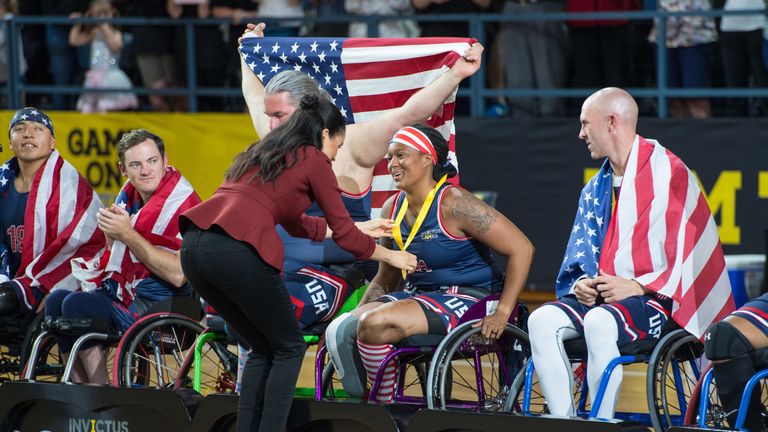 The Duchess of Sussex meets members of the winning US team during the medal presentations at the Invictus Games 2018 wheelchair basketball final in Sydney