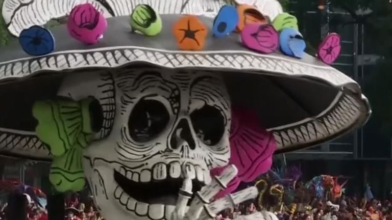 Giant skeletons join the festivities in Mexico City for the Day of the Dead parade