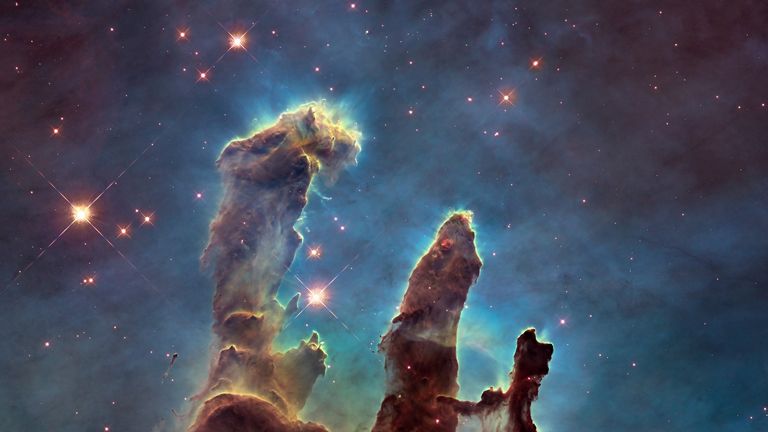 NASA's Hubble Space Telescope has revisited the famous Pillars of Creation, originally photographed in 1995, revealing a sharper and wider view of the structures in this visible-light image.