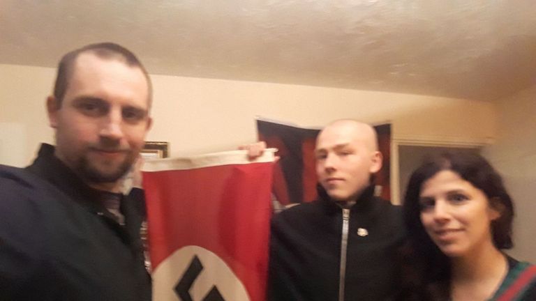 Photo issued by West Midlands Police showing Darren Fletcher (L) who has admitted being a member of National Action, posing with alleged members Adam Thomas and his partner Claudia Patatas