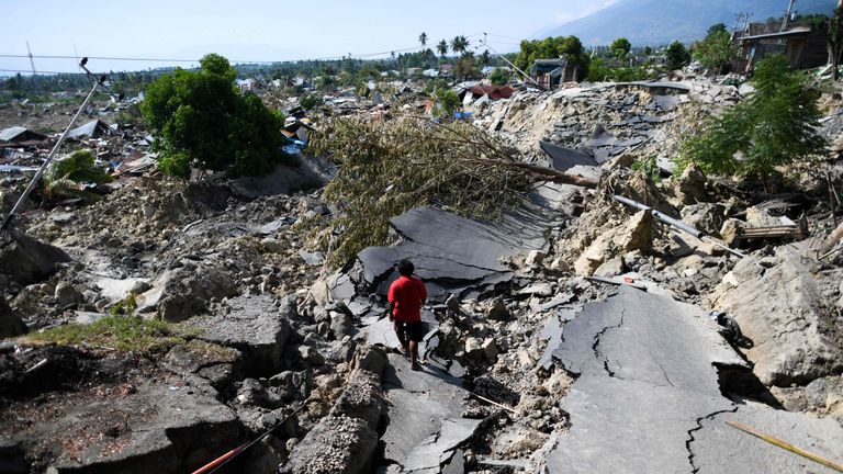 A road destroyed after the ground was affected by liquefaction in Palu