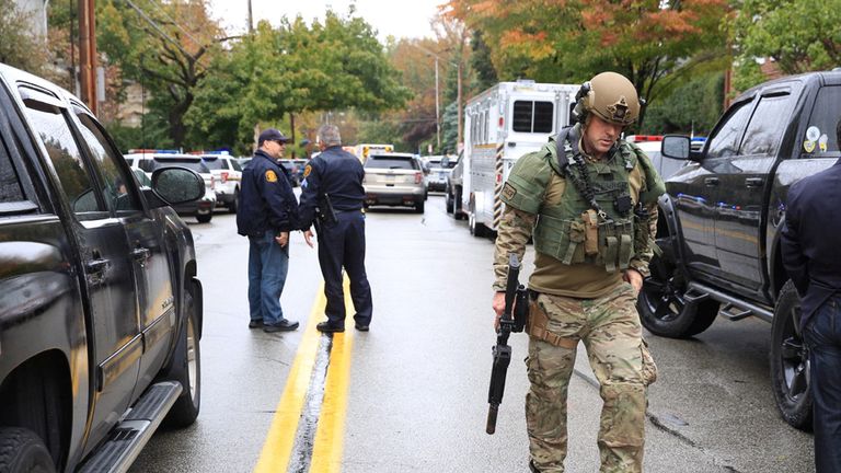 Police officers respond after a gunman opened fire at the Tree of Life synagogue in Pittsburgh Pennsylvania...
