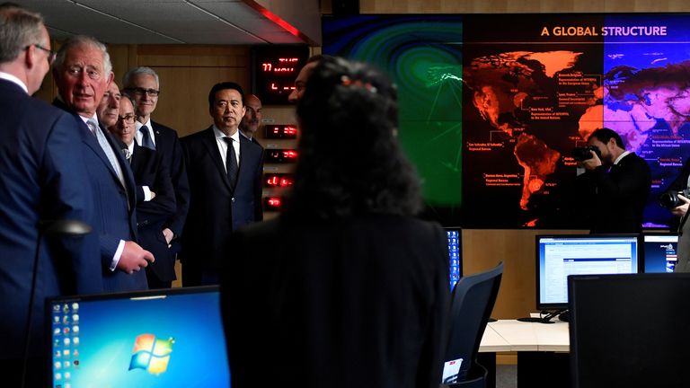 Prince Charles is pictured with Meng Hongwei during his visit to Interpol in May