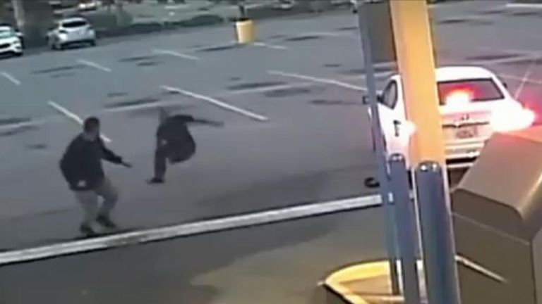 CCTV shows man attacking couple in car and then chased away by two strangers