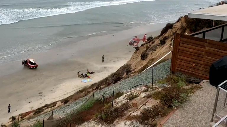 A helicopter landed on the beach. Pic: Twitter/ @JohnRobbins