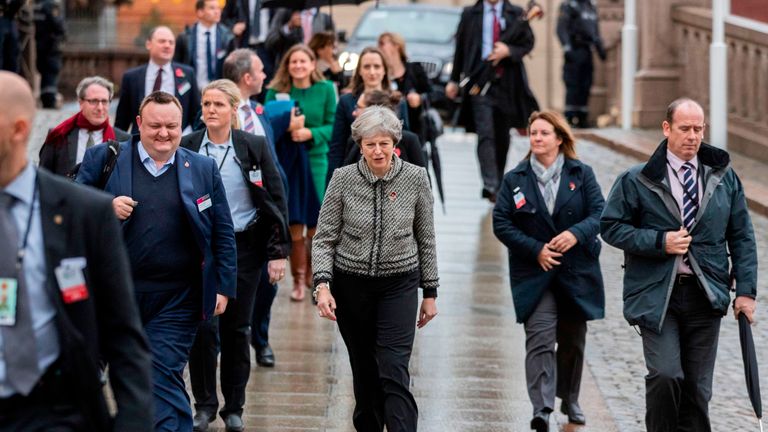 British Prime Minister Theresa May walks through the rainy streets of Oslo on the sidelines of a session of the Nordic Council on October 30, 2018. - The Council session runs until November 1, 2018. (Photo by Hakon Mosvold LARSEN / NTB Scanpix / AFP) / Norway OUT (Photo credit should read HAKON MOSVOLD LARSEN/AFP/Getty Images)
