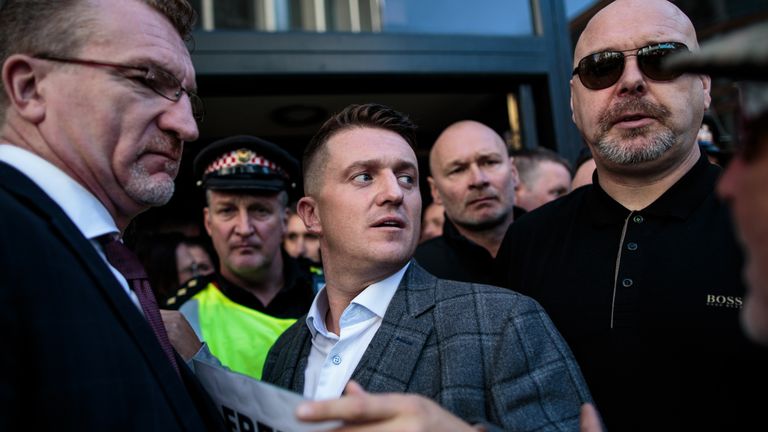 LONDON, ENGLAND - SEPTEMBER 27: Far-right figurehead Tommy Robinson, real name Stephen Yaxley-Lennon greets supporters outside the Old Bailey after his case was adjourned on September 27, 2018 in London, England. The Former English Defence League leader and British National Party member is facing a re-trial on charges of contempt. (Photo by Jack Taylor/Getty Images)