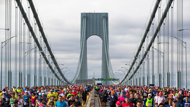 Runners cross the Verrazano-Narrows Bridge during the New York City Marathon in New York, November 3, 2013