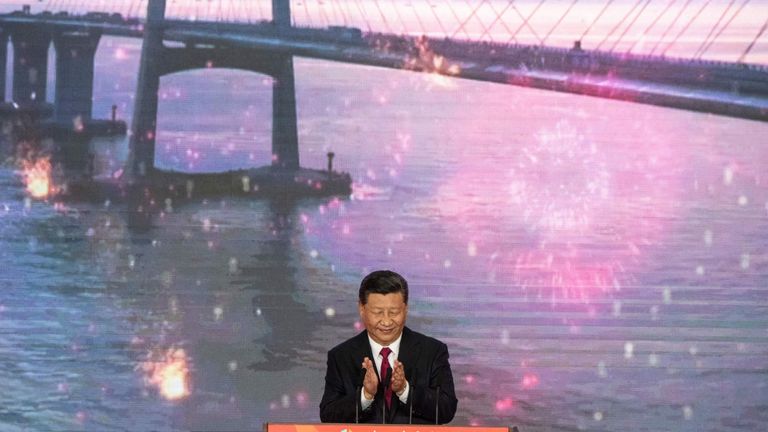China's President Xi Jinping opens the Hong Kong-Zhuhai-Macau Bridge at the Zhuhai Port 