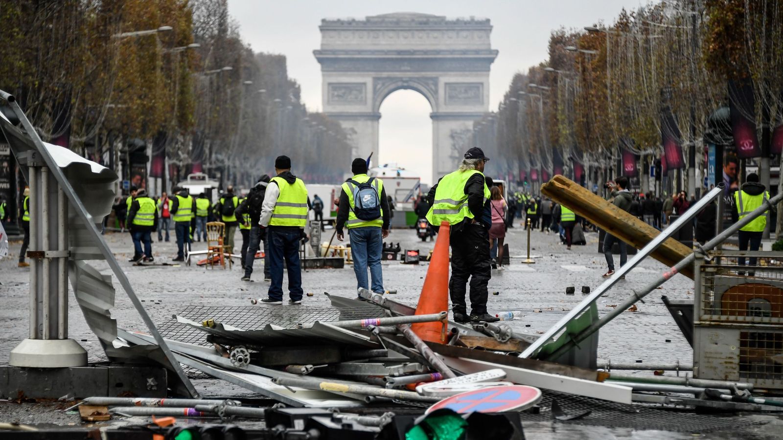 French government blames Marine Le Pen for violent Paris fuel protests