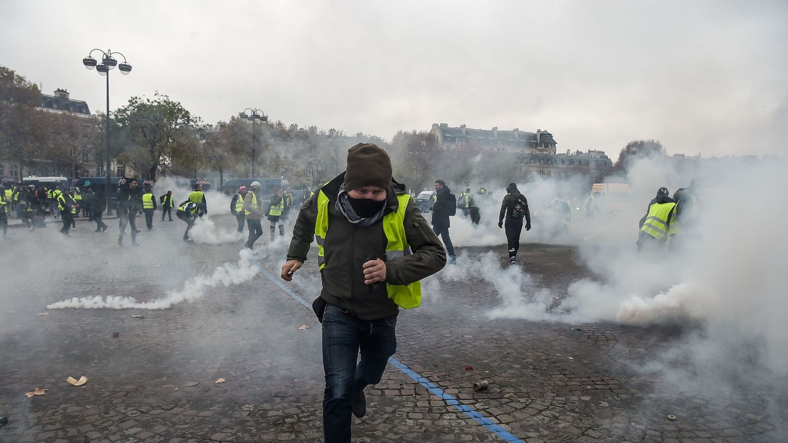 French government blames Marine Le Pen for violent Paris fuel protests