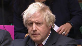 Boris Johnson does not look convinced by the answer he is given by the prime minister in the House of Commons on the proposed Brexit deal