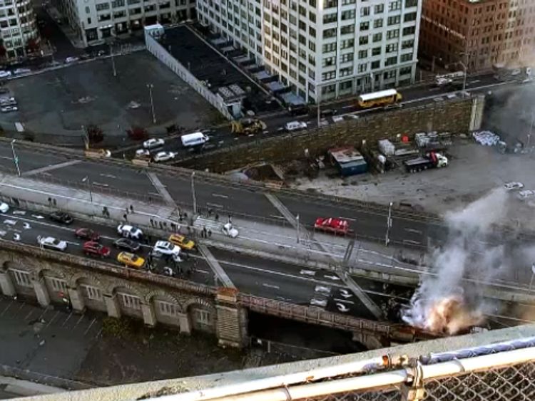 One dead and six hurt as Brooklyn Bridge crash causes huge fireball