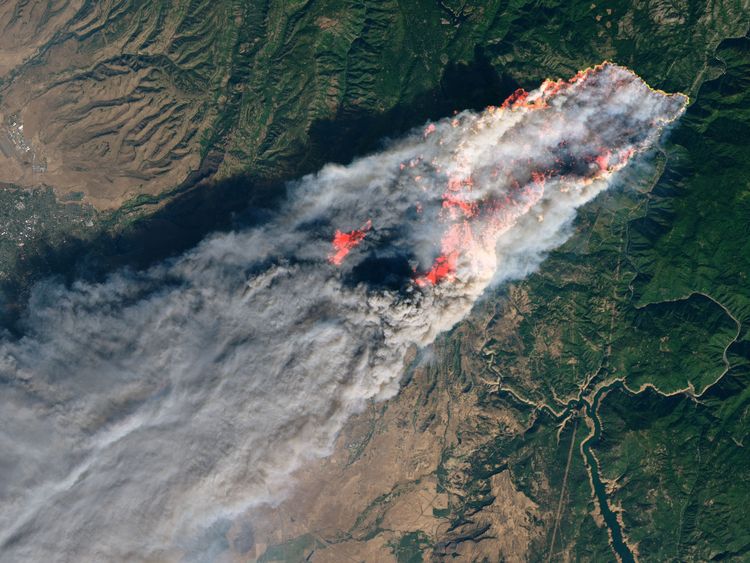 NASA's Operational Land Imager satellite image shows the Camp Fire burning at around 10:45 a.m. local time near Paradise, California, U.S., on November 8, 2018. Picture taken on November 8, 2018. Courtesy NASA/Handout via REUTERS ATTENTION EDITORS - THIS IMAGE HAS BEEN SUPPLIED BY A THIRD PARTY.
