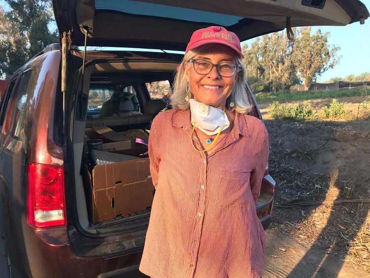 Kerry Clasby's organic farm was part destroyed in Malibu. She ignored evacuation orders and stayed to try to save her farm