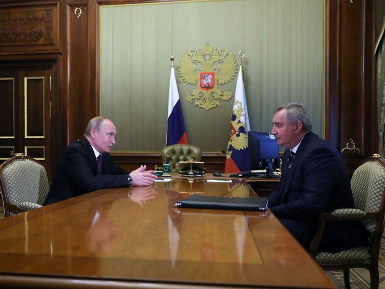 Russian President Vladimir Putin (L) meets with former deputy prime minister Dmitry Rogozin at the Konstantin Palace in Strelna, outside Saint Petersburg, on May 24, 2018. - Vladimir Putin on May 24, 2018 picked former deputy prime minister as head of the space agency Roscosmos, Russian news agencies reported. (Photo by Mikhail KLIMENTYEV / SPUTNIK / AFP) (Photo credit should read MIKHAIL KLIMENTYEV/AFP/Getty Images)