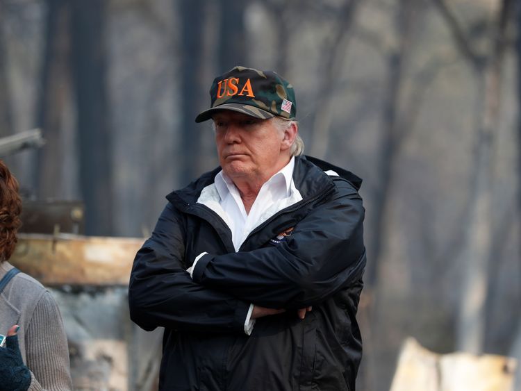 U.S. President Donald Trump visits the charred wreckage of Skyway Villa Mobile Home and RV Park in Paradise, California, U.S., November 17, 2018. REUTERS/Leah Millis