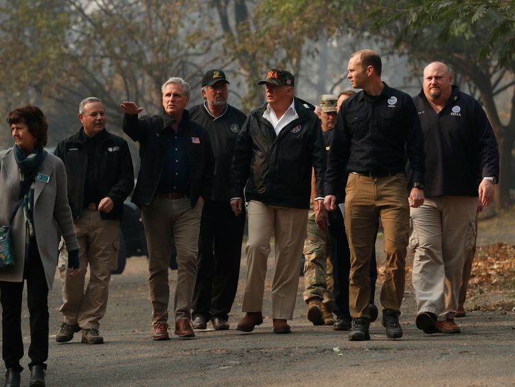 U.S. President Donald Trump visits the charred wreckage of Skyway Villa Mobile Home and RV Park in Paradise, California, U.S., November 17, 2018. REUTERS/Leah Millis